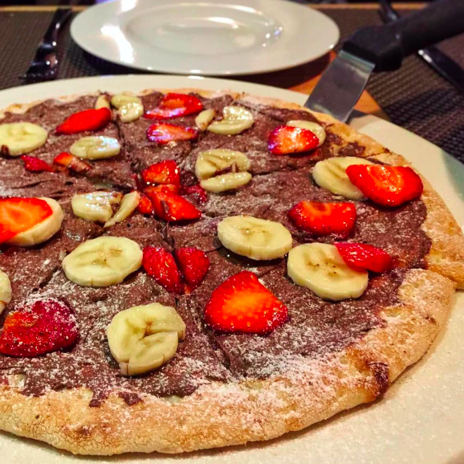 Nutella, strawberry, and banana dessert pizza